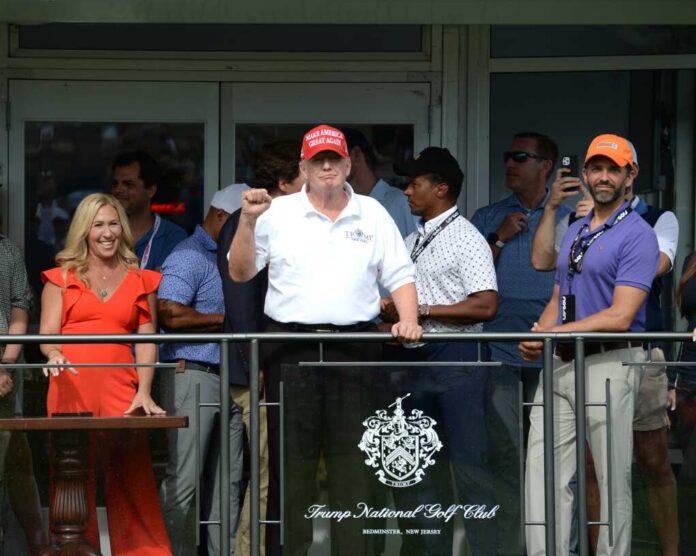 Bedminster,nj-july,31,2022:,Marjorie,Taylor,Greene,(l),,Mr.trump,(c),And,Donald