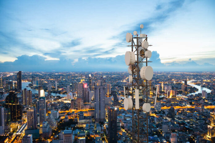 Telecommunication,Tower,With,5g,Cellular,Network,Antenna,On,Night,City