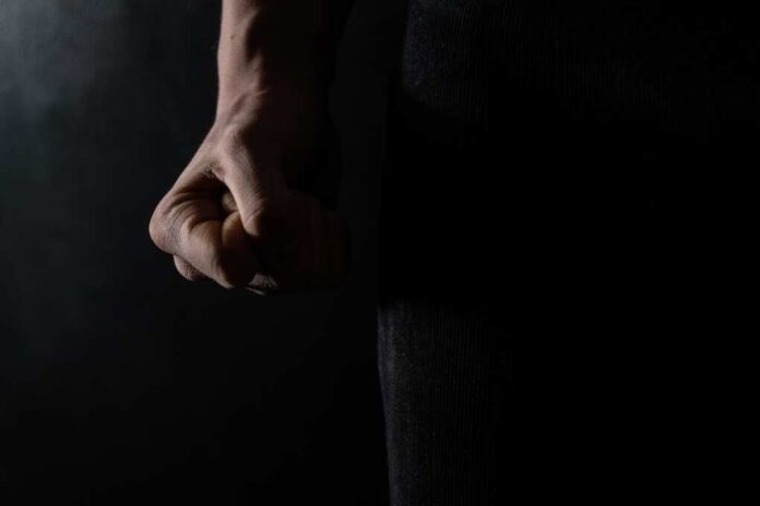 Dark,Photo,Showing,Man's,Fist.,Concept,Showing,Aggression,And,Domestic