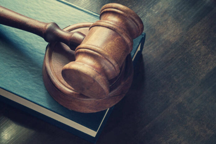 Judge,Gavel,And,Legal,Book,On,Wooden,Table