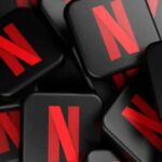 Netflix Pulls Shocking Deal Exit – $83 Billion Stunner A collection of Netflix logos stacked together