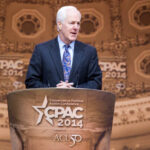 Trump’s Endorsement Gamble Puts Senator on Edge A politician speaking at the Conservative Political Action Conference