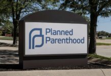 Sign for Planned Parenthood outside a healthcare facility