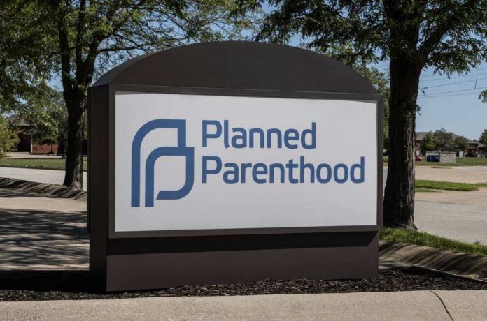 shutterstock_2504921555.jpg Sign for Planned Parenthood outside a healthcare facility