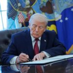 Trump’s Bold Oil Move Defies Newsom A person in a suit signing documents at a desk in the Oval Office