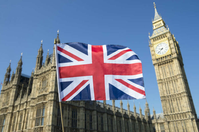 shutterstock_433815025.jpg Union Jack flag in front of Big Ben and the Houses of Parliament
