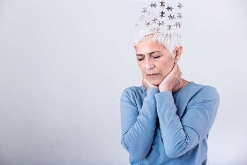 Elderly woman with a unique hairstyle made of puzzle pieces, looking thoughtful