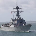 A naval destroyer sailing in the ocean