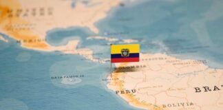 Map of South America with a flag pin marking Ecuador