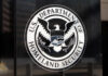 Seal of the U.S. Department of Homeland Security displayed on a building