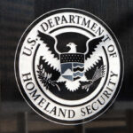 Seal of the U.S. Department of Homeland Security displayed on a building