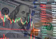 Overlay of stock market data on a background of hundred dollar bills