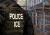Police officer in tactical gear standing in a detention center