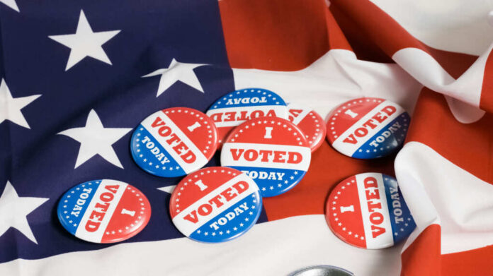 Voting buttons on an American flag background