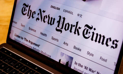 Close-up of The New York Times website displayed on a laptop