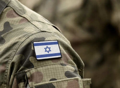 Flag,Of,Israel,On,Military,Uniform.,(collage). Close-up of a military uniform with an Israeli flag patch