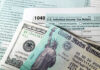 U.S. Individual Income Tax Return form with cash