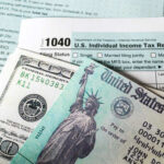 Tax Rule Ambush: Millions Face Hefty Penalties U.S. Individual Income Tax Return form with cash