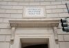 Mystery Fund To End Trump’s IRS Feud? Entrance of the Internal Revenue Service building with architectural details