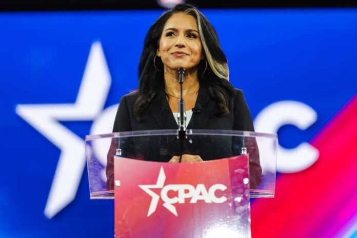 National,Harbor,,Md,,Usa-,February,24,,2024:,Former,Hawaii,Rep. A woman speaking at a podium with a CPAC logo in front of a colorful background