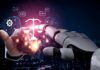 A human hand reaching out to a robotic hand, symbolizing interaction between AI and justice.