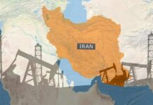 Iran Tensions SOAR as Trump’s Strike Paused Map of Iran highlighting oil production areas with oil rigs in the foreground