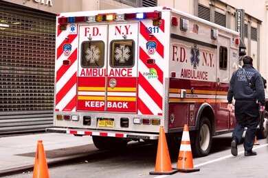 1392214784 FDNY ambulance parked on a city street