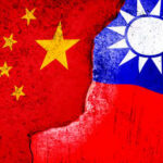 Taipei Invites Snitches—Global Spy Game Escalates A visual representation of the flags of China and Taiwan with a distressed texture