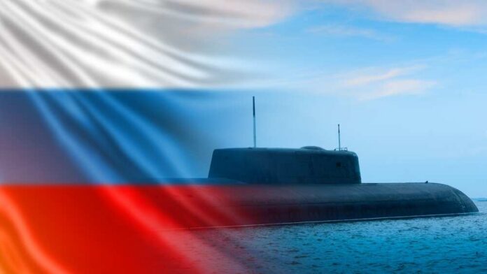 Military,Submarine,Of,Russia.,Sub,Boat,Against,Background,Of,Russian A submarine partially submerged in water with the Russian flag in the background