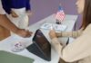 Federal Sweep Hits Local Voter Rolls Individuals participating in the voting process at a polling station