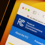 Culture War Erupts Over TV Warnings Close-up of the Federal Communications Commission website displayed on a screen