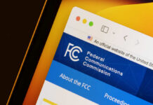 Close-up of the Federal Communications Commission website displayed on a screen