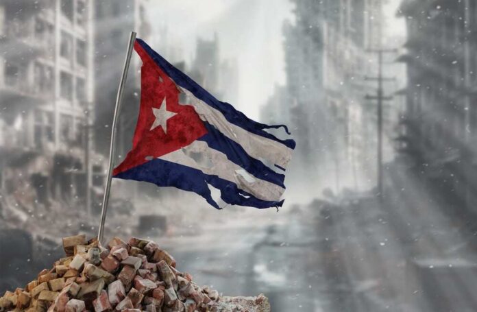 Dirty,And,Torn,Cuba,Flag,,Symbol,Of,Resistance,And,Victory. Tattered Cuban flag waving over a pile of rubble in a devastated urban landscape
