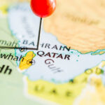 Gulf Night Erupts — What Really Hit Bahrain? Map of Qatar with a red pin marking the location