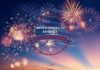 What Happened At Mount Rushmore? Fireworks burst over a twilight sky with a USA anniversary emblem
