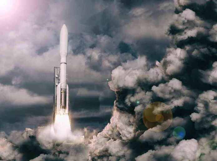 shutterstock_1029537238 Rocket launches through dense clouds