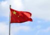 Market Panic Over The ‘Wrong’ Chip Tool Chinese national flag waving on a flagpole