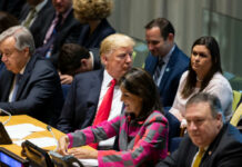 NATO Meltdown: Trump Targets Spain A group of political leaders seated at a United Nations meeting, engaged in discussion