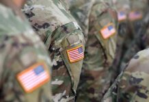 Soldier’s Chilling Confession Shakes Pentagon U.S. flag patches on camouflage military uniforms