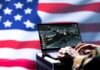Data Brokers Expose U.S. Soldiers Laptop with surveillance software against a blurred American flag