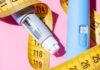 Poison Calls Surge Over Weight-Loss Drug An insulin pen and measuring tape on a pink background