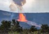 Volcano Watch: Kīlauea About To Blow Volcano erupting with a fountain of lava behind shrubs