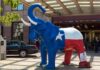 Republicans Hold Huge Fundraising Lead Large elephant statue painted like the Texas flag outside a building entrance