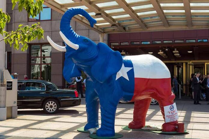 shutterstock_457083481 Large elephant statue painted like the Texas flag outside a building entrance