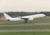 Contrail Crackdown Over The Atlantic White commercial airplane taking off from runway