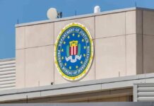 Inside The FBI’s Controversial Biden Review FBI emblem on a beige building facade