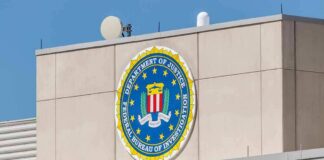 FBI emblem on a beige building facade