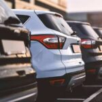 Row of parked SUVs in a lot