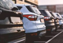 Mall’s Front-Row Toll Sparks Outrage Row of parked SUVs in a lot