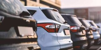 Row of parked SUVs in a lot
